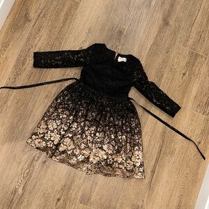 Little Angels by US Angels girls dress size 4. Black lace, gold detailing.Pretty